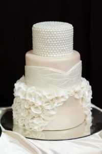 Elegant pearl decor wedding cake