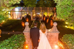 Alejandra Poupel Events photo of couple looking at their wedding tent