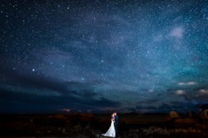 Romantic couple in a starry night sky