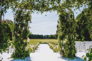 floral and greenery arch for french destination wedding