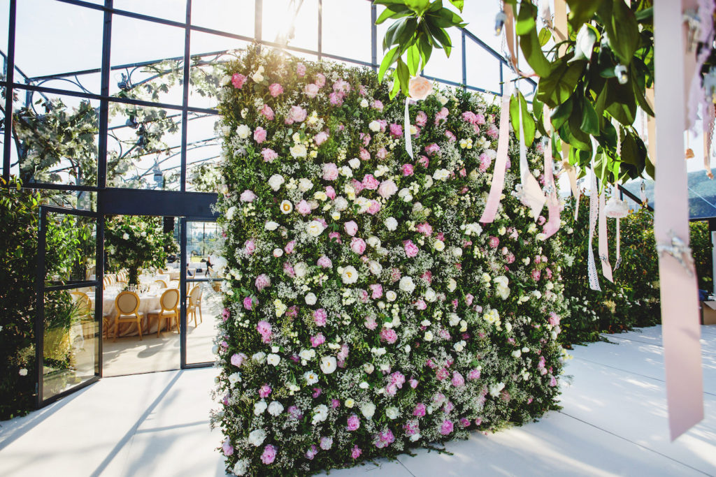 flower wall at french destination wedding