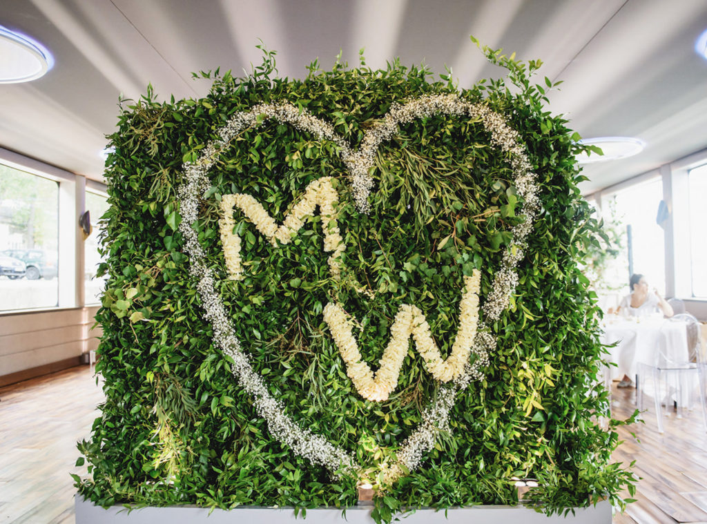 floral-wall-with-couple-monogram-for-welcome-party
