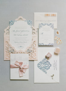 ornate blush and blue wedding invitation suite