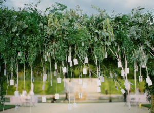 greenery arch with hanging escort cards