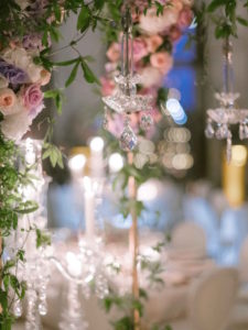 hanging crystals from floral centrepiece