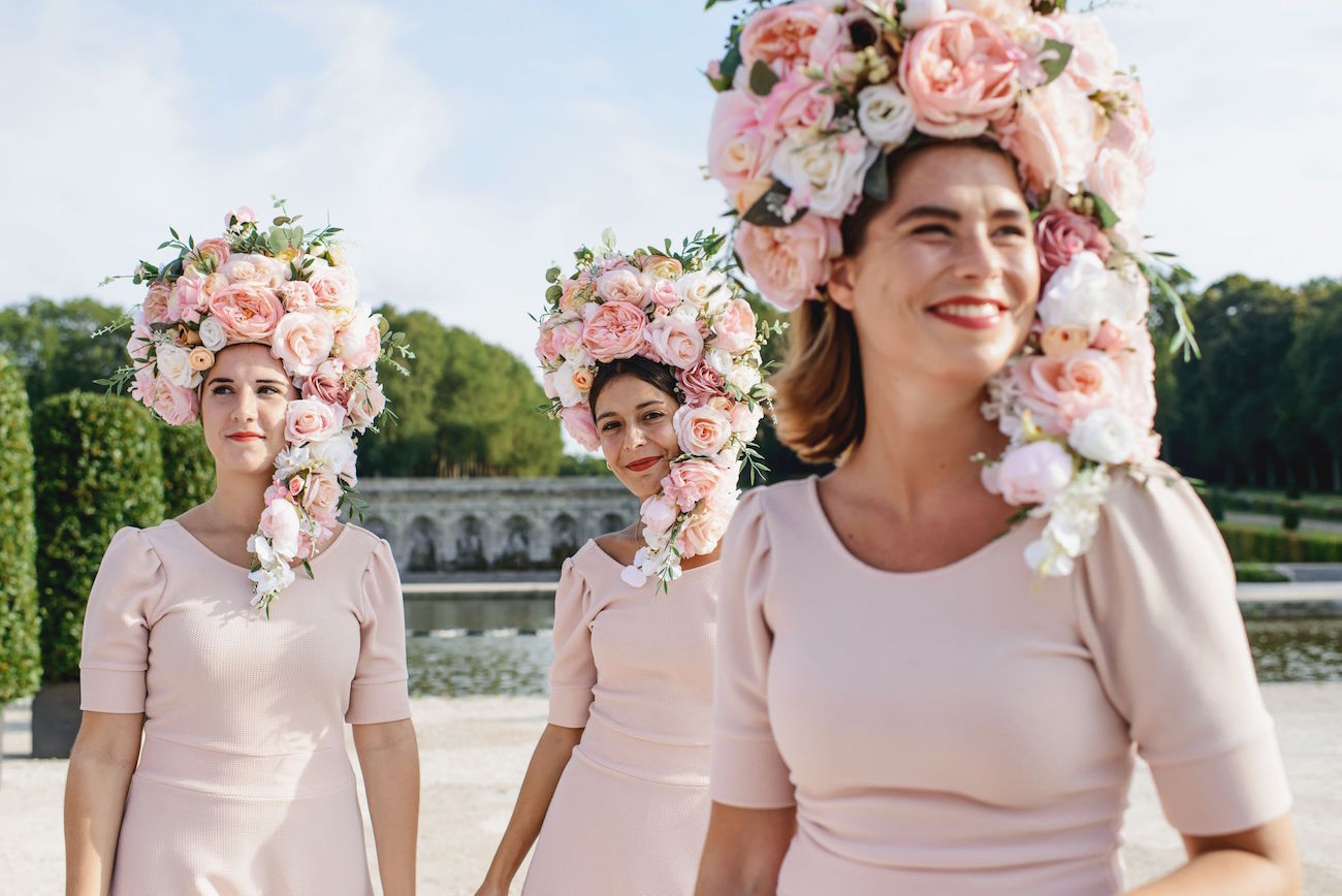hostesses with floral headpieces for wedding at Château de Vaux-le-Vicomte