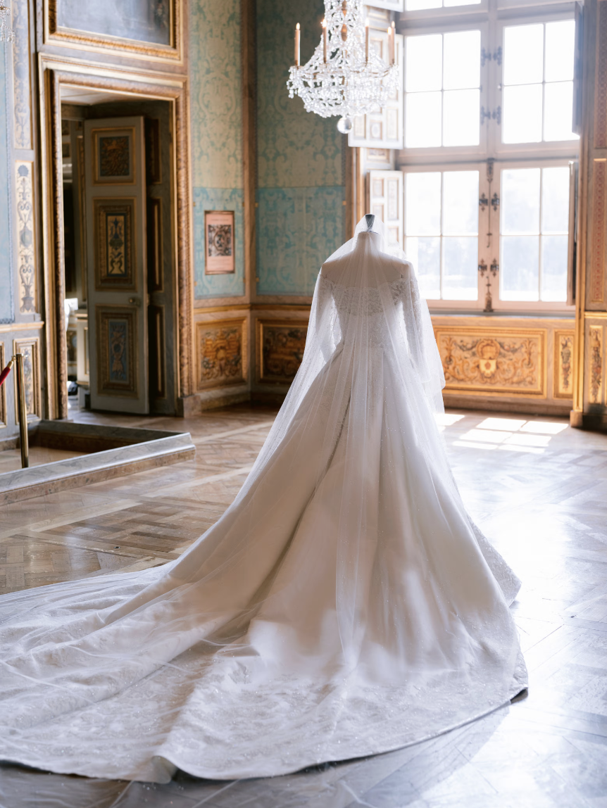 Bride in Dior gown at château wedding France